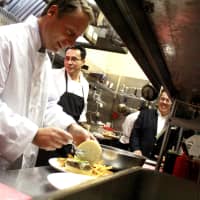 <p>County Executive Robert Astorino in the kitchen making the Iron Horse’s new signature dish – the “Astorino Burger.”</p>