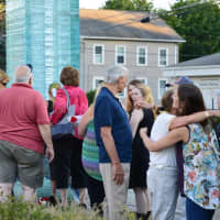 <p>Those in attendance pay their respects at the 9/11 memorial at the end of the event in Danbury. </p>