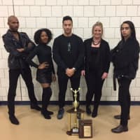 <p>The Norwalk High School Cheerleading coaching staff was named the Coach of the Year by the league.</p>