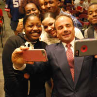 <p>Bridgeport Mayor Joe Ganim, center, launched new programming and job opportunities for city youth Wednesday at City Hall.</p>
