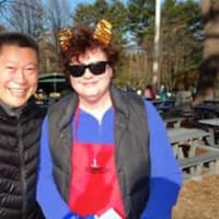 <p>Sen. Tony Hwang with Patricia Boyd, president of the Junior League of Eastern Fairfield County, at the 5K fundraiser at the Beardsley Zoo.</p>