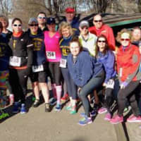 <p>Runners at the finish line of the third annual 5K Run/Walk fundraiser for the Junior League of Eastern Fairfield County.</p>