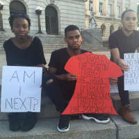 <p>Organizer Robert Harris, 19, is joined by Alaina Thorne, 23, of Englewood and Wildany Guerrero, 19, of Hackensack.</p>