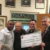 <p>Eugene Chesney, guest speaker and former Homes for the Brave resident, along with Patriot Dinner co-chairman Al Latte, co-chairman and Faithful Navigator Bishop Fenwick Assembly 100 George Ribellino, Jr., and Homes for the Brave CEO Vince Santilli</p>