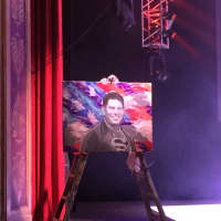 <p>Artist Scott LoBaldo&#x27;s tribute to &quot;Superman&quot; Detective Joseph Lemm, a technical sergeant killed by a suicide bomber in Afghanistan in December. A fundraising concert to benefit Lemm&#x27;s West Harrison survivors was held Thursday night in Port Chester.</p>