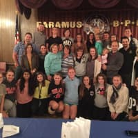 <p>Volunteers gather for a photo after packing goody bags at the Paramus Elks Lodge on Oct. 14.</p>