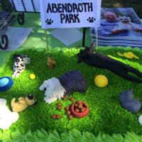 <p>This cake, donated by Carmen Brito, was &quot;woofed down&quot; by dog owners touring Sunday&#x27;s opening of a new park for canines in Port Chester.</p>