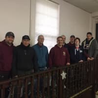 <p>Members of the Norwalk Knights of Columbus and Fairfield student Sean Mitchell helped the Notre Dame Convalescent Home get ready for winter by winterizing its windows.</p>