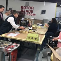 <p>Sen. Chris Murphy, far left, learns about the aerospace industry work done by Prestige Industrial Finishing in Shelton.</p>
