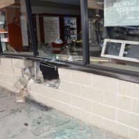 <p>A storefront received damage after a driver smashed into the front of the store.</p>