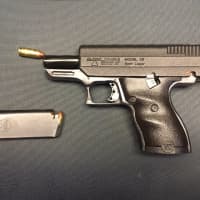 <p>State troopers found the loaded  9mm handgun in the trunk of the car.</p>