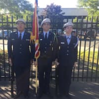 <p>The Air Force JROTC preforms the Posting of Colors at the Norwalk High graduation.</p>