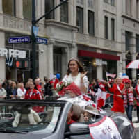 <p>Zaneta Zachwieja rides in the back of a car as Miss Polonia in Manhattan, New York City.</p>