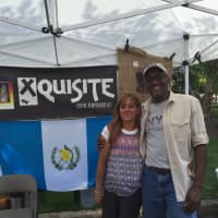 <p>Xquisite Coffee Plantation owners Mark and Jovita Jefferson pictured with their company&#x27;s sign.</p>