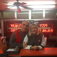 <p>Junior and Cindy Oppido sit at JoJo&#x27;s, on their last night as owners.</p>