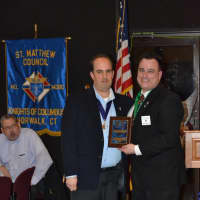 <p>Past Grand Knight George Ribellino presents Council Knight of the Year to Anthony Armentano.</p>