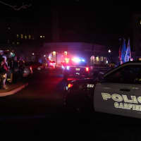 <p>Loved ones lined up on one side and a police honor guard on the other, as a procession of police vehicles passed.</p>
