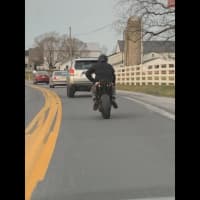 <p>Still from a dash cam of a motorcyclist who fled and eluded police in Lancaster County, Pa.</p>