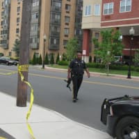 <p>A Hackensack police officer on the crime scene.</p>