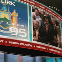 <p>New York gave Donald Trump the votes he needed to become the GOP nominee for president as he got 89 of the 95 delegates from his home state. The Jumbotron in the Quicken Loans Arena broadcast the moment to the entire crowd.</p>