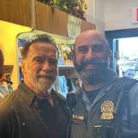 <p>Ridgewood Police Sgt. Mike Lembo with Arnold Schwarzenegger.</p>