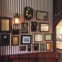 <p>Some of the community awards on display at The Iron Horse in Westwood.</p>