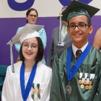 <p>The 8th grade class at Isaac E. Young recently held their graduation.</p>