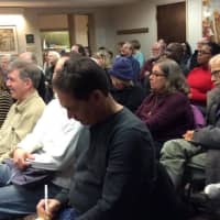 <p>The crowd takes notes as financial writer Jane Bryant Quinn talks about her new book on retirement at the Danbury Public Library.</p>