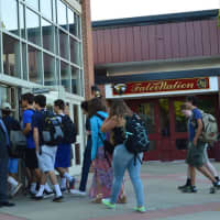 <p>Teachers welcome students at Joel Barlow High School on Wednesday morning for the first day of school. </p>