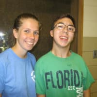 <p>Katlyn Courtney, left, helps children with Autism and other developmental disabilities enjoy summer as a counselor with North East Westchester Special Recreation.</p>