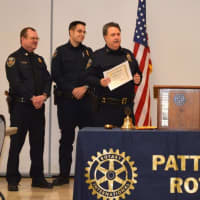 <p>Ken Ross, Chief of the Putnam County SPCA, accepts a donation from the Rotary Club in Patterson with officers Ken Ross III, his son, and Doug MacCrae.</p>
