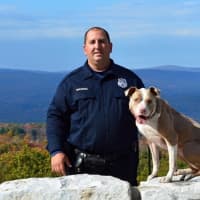 <p>K-9 Kiah, shown with police partner, Officer Justin Bruzgul of the city of Poughkeepsie police department, has been nominated for a &quot;Hero Dog&quot; award, which is given out by the American Humane Society.</p>