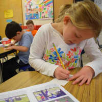 <p>Students practice note-taking at Bronxville Elementary School.</p>