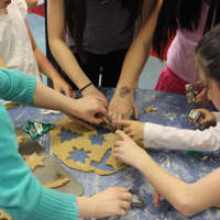 <p>Local children cut out homemade dog biscuits to give to homeless animals. This year&#x27;s workshop will be on Tuesday, May 24, from 4:30-5:30 p.m. in the Children&#x27;s Department at Pequot Library.</p>