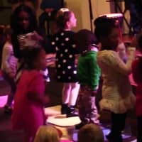 <p>Kids dance along to a Jungle Gym Jam performance in 2014.</p>