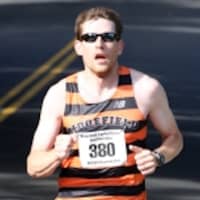 <p>Ridgefield High School cross country coach Bryan Kovalsky won the Ridgefield Half Marathon on Sunday. </p>