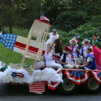 <p>The New Fairfield Board of Selectmen are shown aboard a patriotic float in the town&#x27;s July 4th parade.</p>