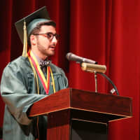 <p>Graduate Anthony Rigaglia speaks during commencement exercises Saturday at Lakeland High School in Yorktown.</p>