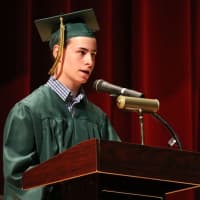 <p>Graduate Matthew Murnane reads an original poem at Lakeland High School&#x27;s commencement exercises in Yorktown Saturday.</p>