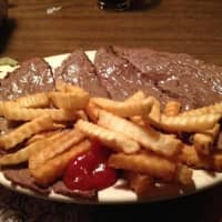<p>The Lido&#x27;s fries on top of its open-faced steak sandwich is a customer fave.</p>