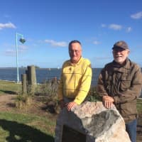 <p>Phil Blagys, former president of the Black Rock Community Council, and Stuart Sachs, who leads the Council&#x27;s Lighthouse Committee, stand at St. Mary&#x27;s By the Sea, a Bridgeport park overlooking the Black Rock Lighthouse, visible in the distance.</p>