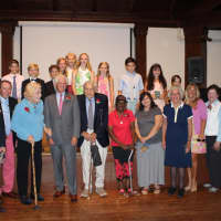 <p>Local students honored 12 local adults recently at the Pequot Library in an event called “Meet Our Local Heroes from the Community.” </p>