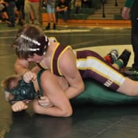 <p>Nick Augeri, who went  5-0 for the Mad Bulls and won the tournament title, clamps down on a New Milford wrestler.</p>