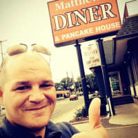 <p>A happy customer at Matthews&#x27; Diner and Pancake House in Bergenfield.</p>