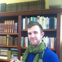 <p>Max Weber of The Book Cove in Pawling with &quot;M Train&quot; by Patti Smith.</p>