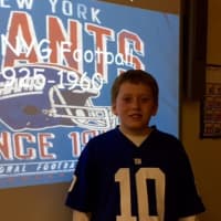<p>A student presents on the New York Giants.</p>