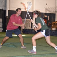 <p>Northern Highlands Varsity Lacrosse Coach Mike Menzella puts some pressure on an athlete during tryouts for X-Treme Lax Factory&#x27;s Club Team on Sept. 20.</p>