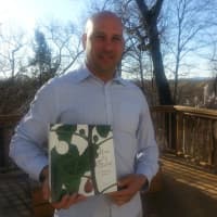 <p>Poughkeepsie resident Michael Fanelli with his favorite fig cookbook.</p>