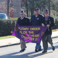 <p>Military Order of the Purple Heart Chapter 21, with veterans Neil Gross, Dale Novak and Eugene Lang march in a Veterans Day parade in Shrub Oak.</p>