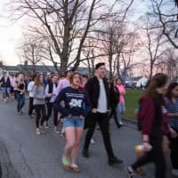 <p>Participants walk during the Millbrook School&#x27;s annual &quot;Relay for Life,&quot; an event that raised $5,000 for cancer research.</p>